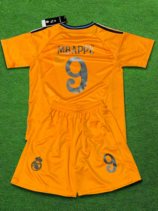 Orange MBAPPE 9 jersey top with matching shorts, Real Madrid crest on left