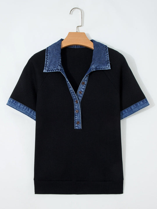 Black polo-style top with denim collar, button placket, short sleeves