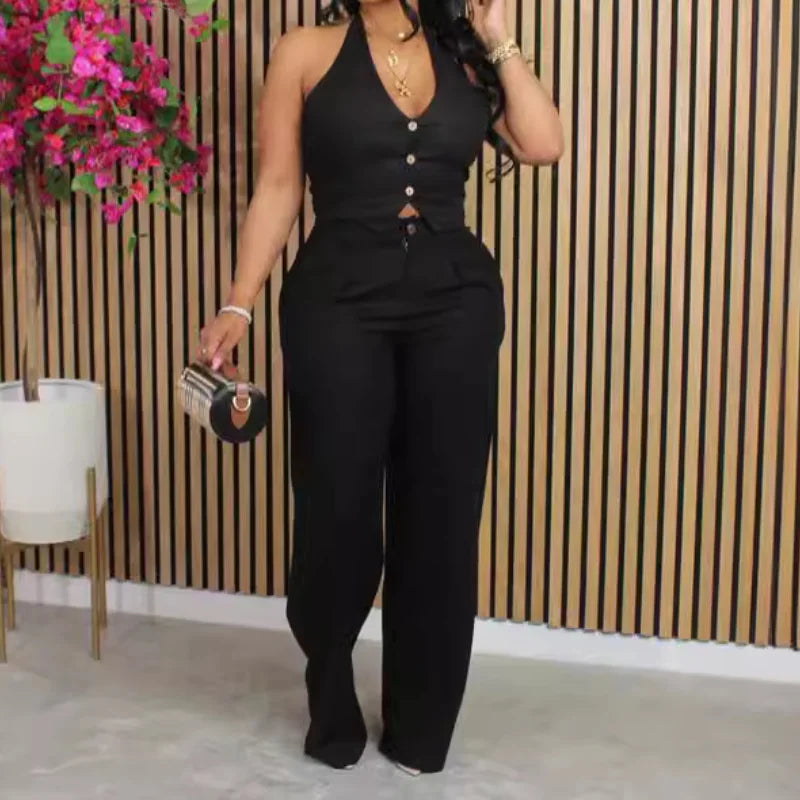 Black two-piece set: sleeveless button-front vest top with matching long pants
