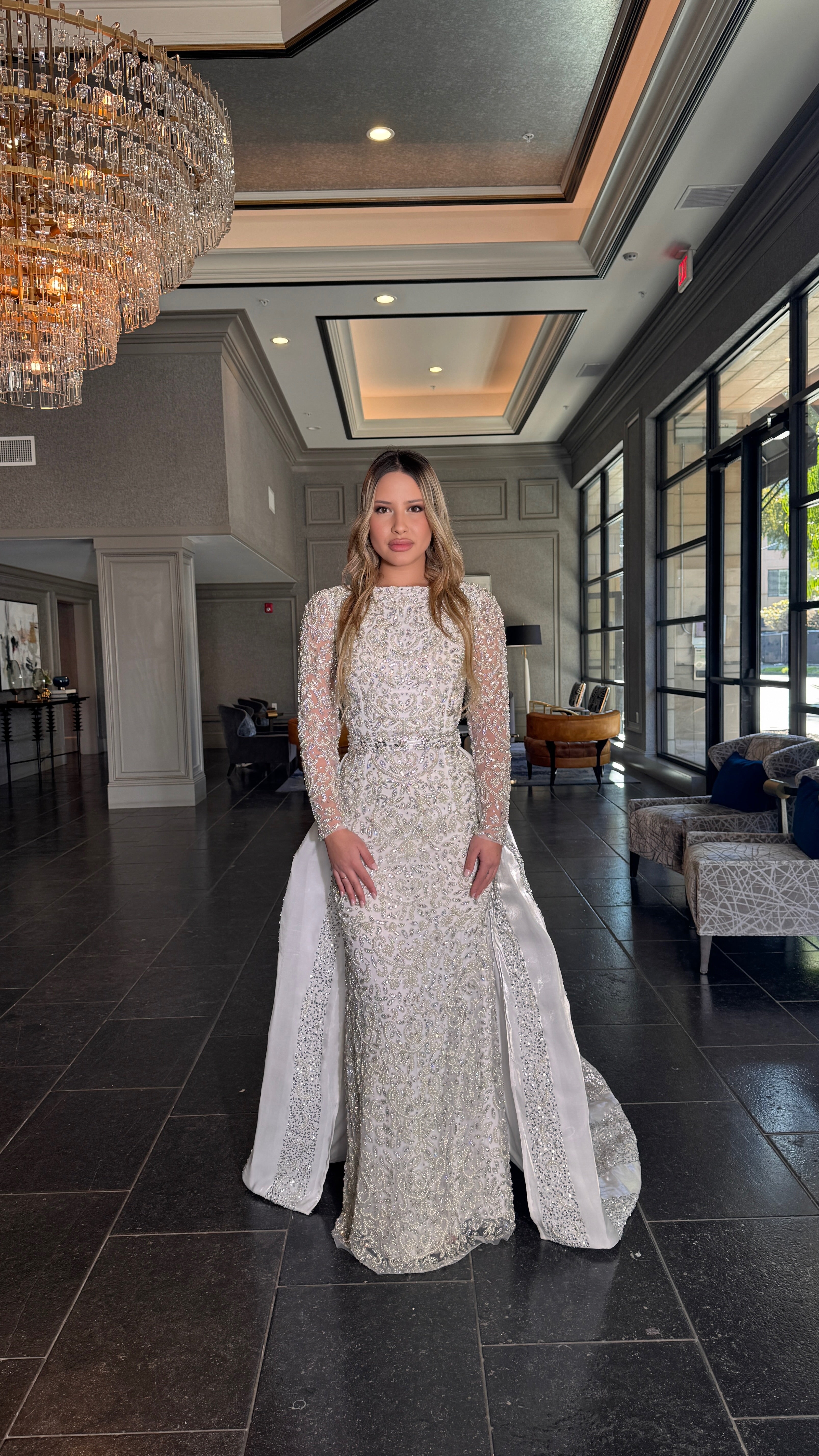 Pearl-crystal beaded white gown with detachable overskirt and long sleeves