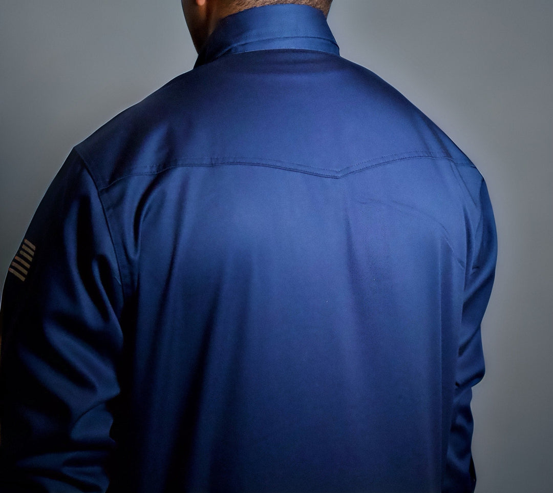 Back view of navy FR western shirt with yoke seam and rear pocket