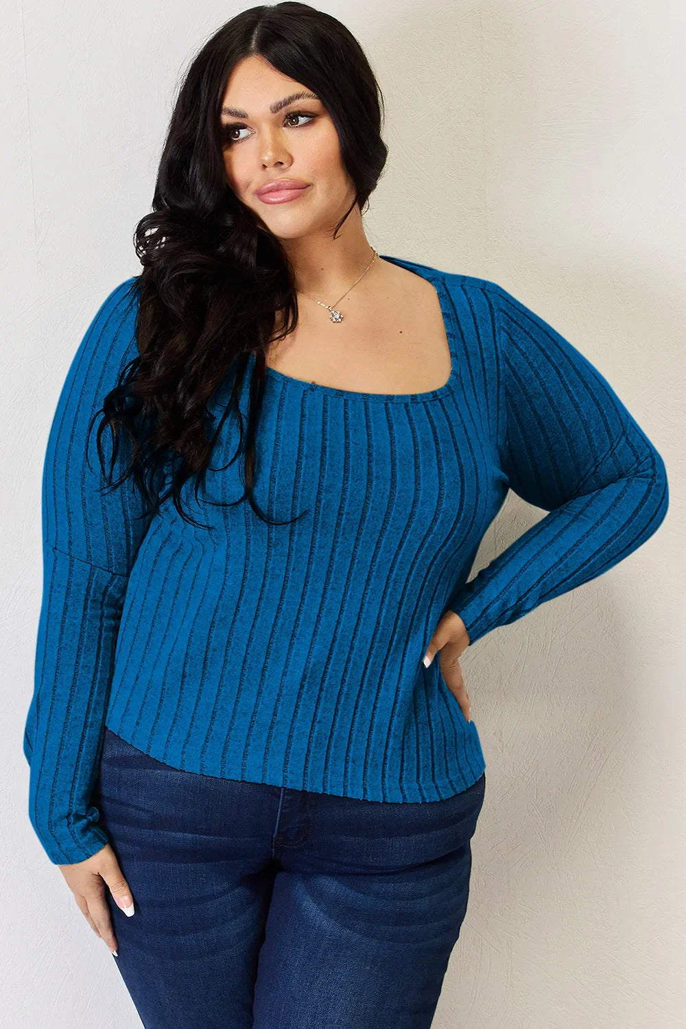 Sky blue ribbed long-sleeve T-shirt, scooped round neck and curved hem