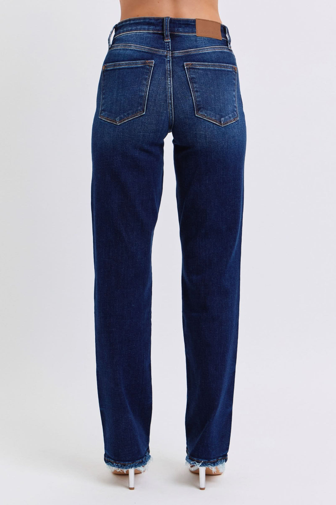 Judy Blue Dark jeans back view, straight leg, two back pockets, raw hem