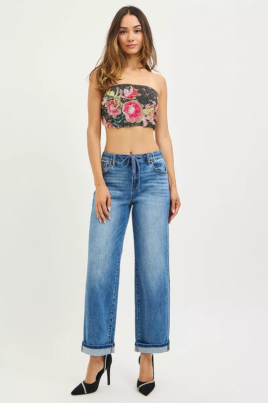 Medium wash slouchy boyfriend ankle jeans with elastic waist tie and cuffed hem