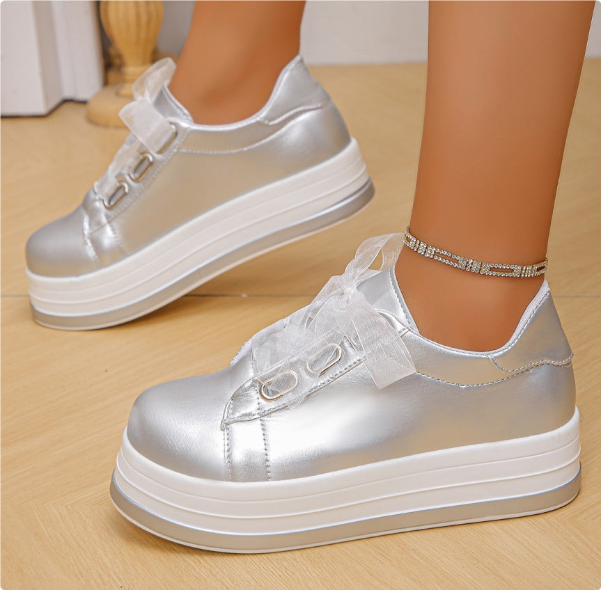 Silver lace-up platform sneakers with tulle bow, round toe, rhinestone ankle chain