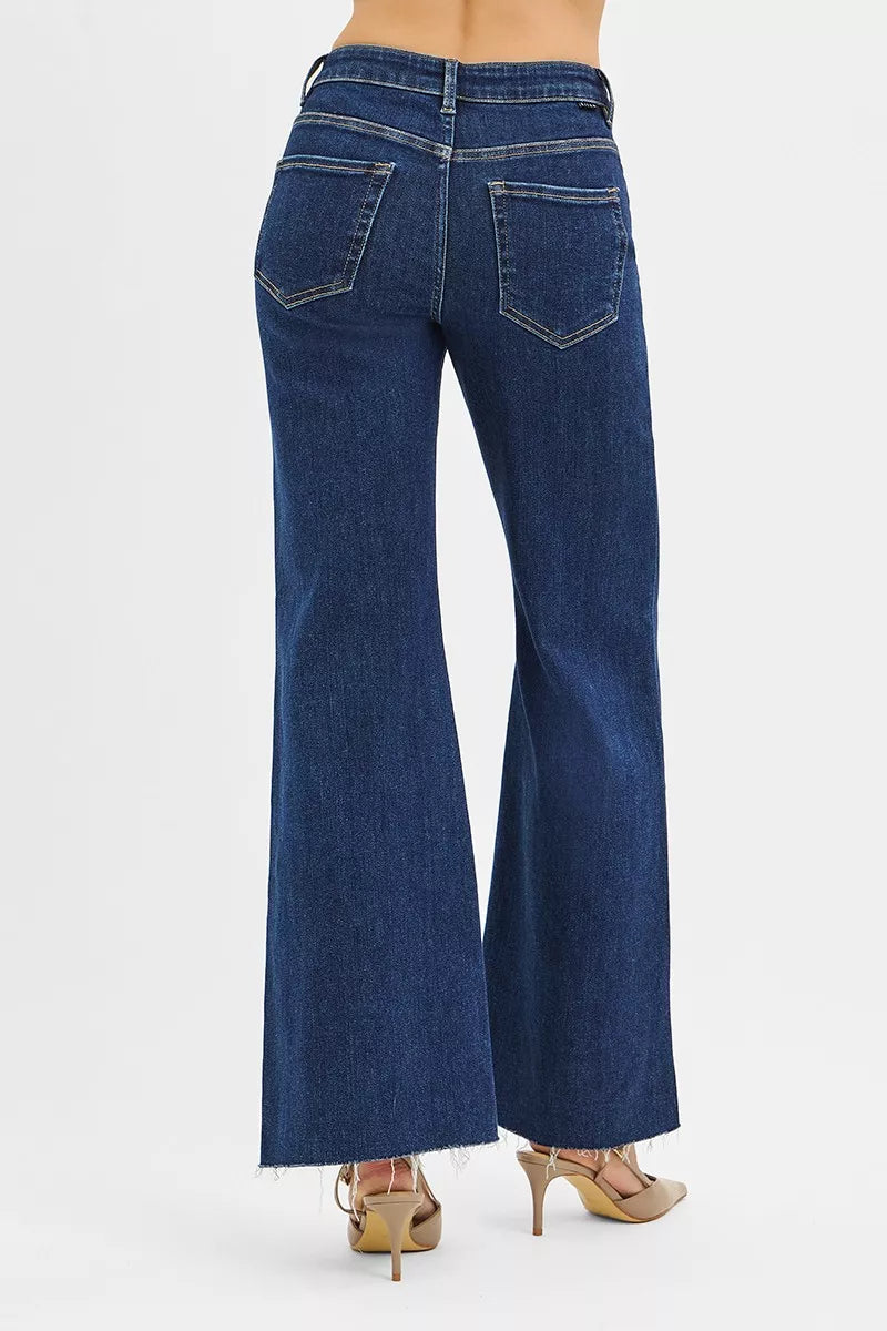 Dark high-rise wide-flare jeans back view with two welt pockets and button closure