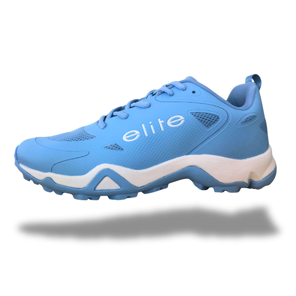 Light blue turf soccer cleat with molded grip outsole and lace-up upper