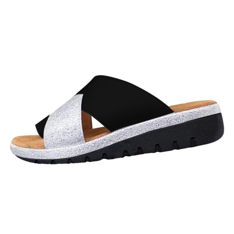 Silver and black women’s slide sandals with open toe and grippy sole