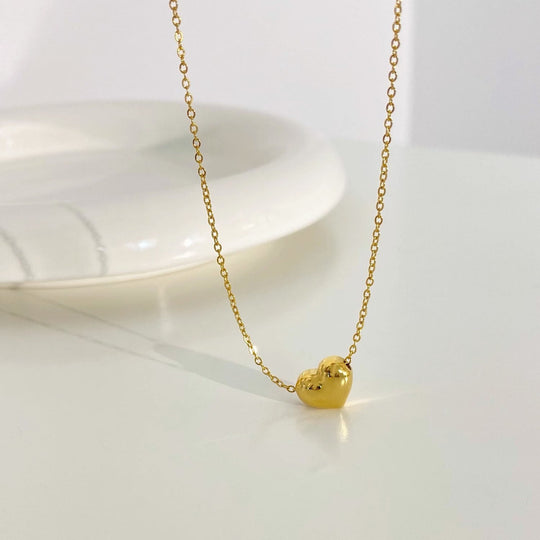 TRIDIUM HEART gold-tone necklace with small heart charm pendant