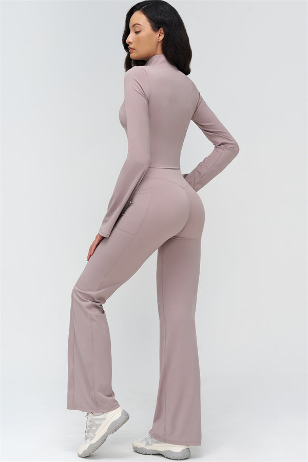 Rosa Rückansicht des Trainingssets: hochschließende Jacke und Flared Leggings