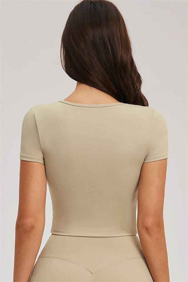 Almond fitted tee and leggings, back view with scoop neckline
