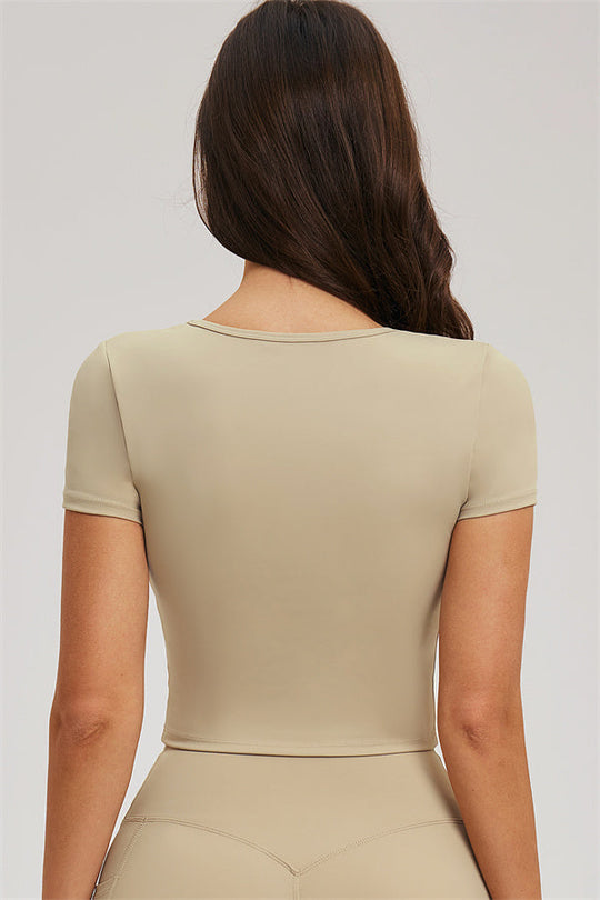 Almond fitted tee and leggings, back view with scoop neckline