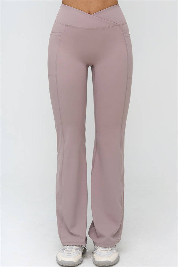 Rosa Flared Leggings mit glatter Rückansicht und mittiger Naht, hoher Bund