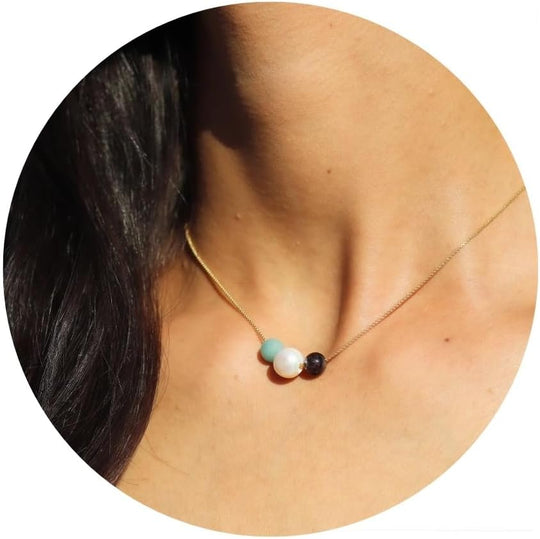 Gold chain necklace with white pearl, turquoise bead, and dark bead, minimalist pendant