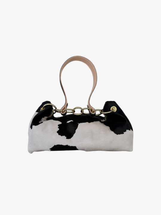 Cow-print East-West tote with chain handle and snap closure