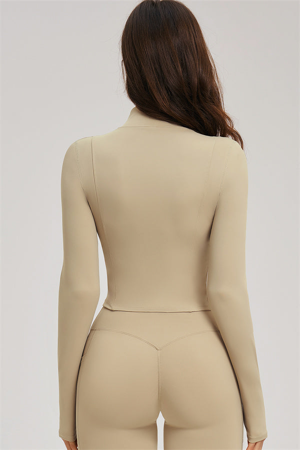 Almond back view: zip jacket and high-waist flared leggings