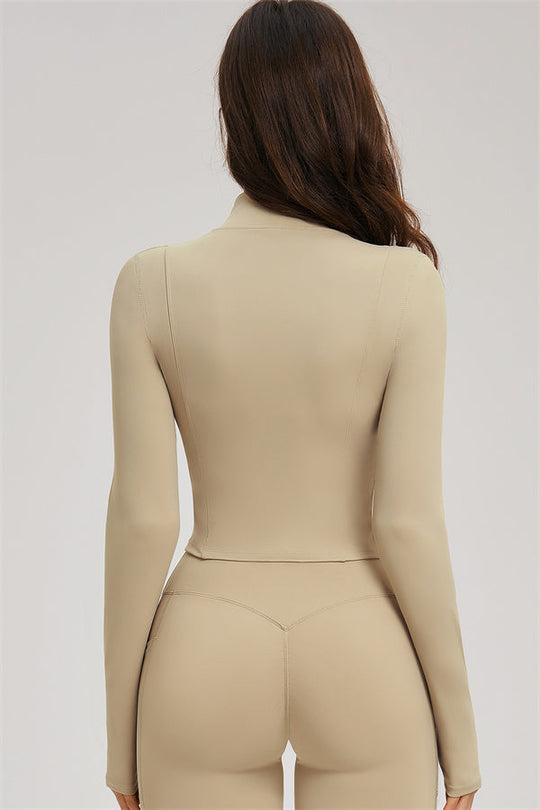 Almond back view: zip jacket and high-waist flared leggings