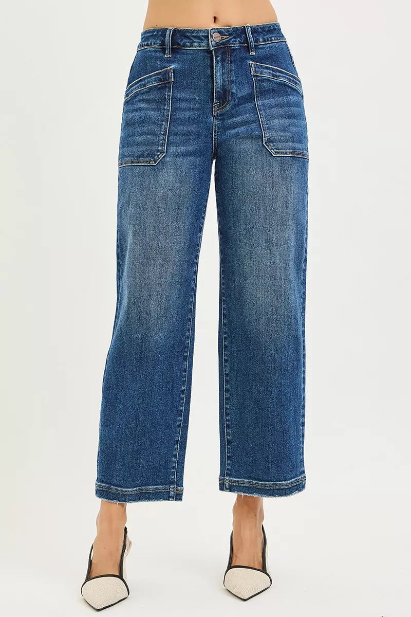 Dark blue cropped baggy jeans with front patch pocket and belt loops