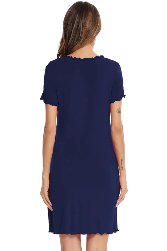 Vestido lounge azul marino, vista trasera, cuello redondo y bajo ondulado