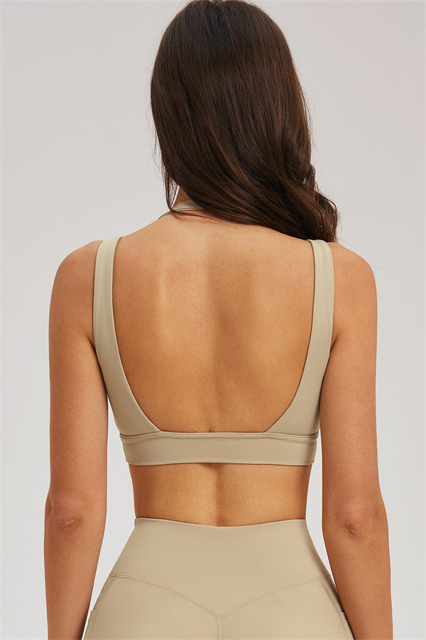 Almond sports bra back view with racerback straps