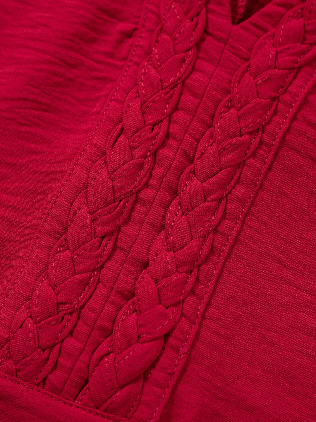 Close-up of Deep Red braided embroidery panel on V-neck half-sleeve blouse
