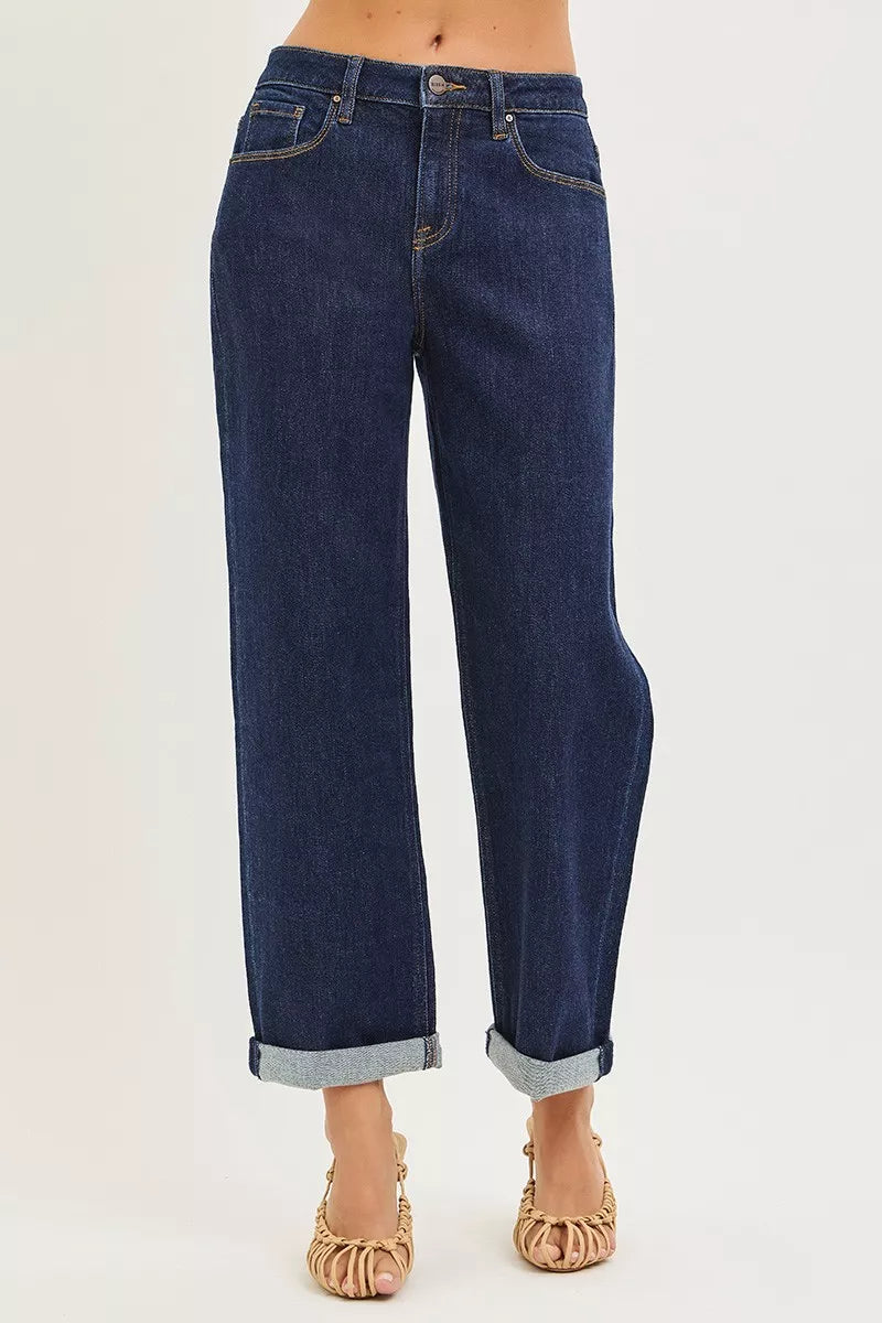 Dark blue boyfriend jeans with relaxed leg, cuffed hems and front seam detailing