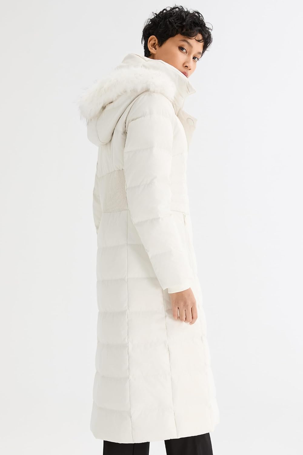 White long puffer coat side view with fur-trim hood