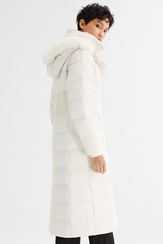White long puffer coat side view with fur-trim hood