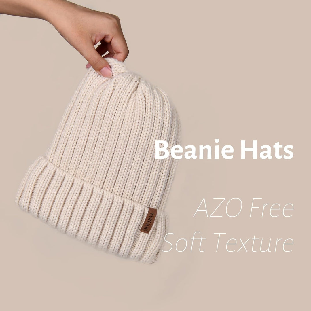 Cream knit beanie with folded cuff and leather patch, fleece lining
