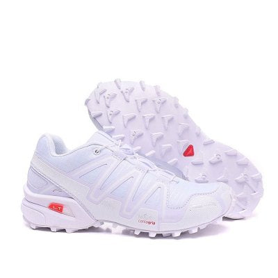 White off-road hiking shoes with textured grip sole