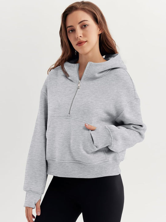 Grey half-zip hoodie with hood and kangaroo pocket, long sleeves