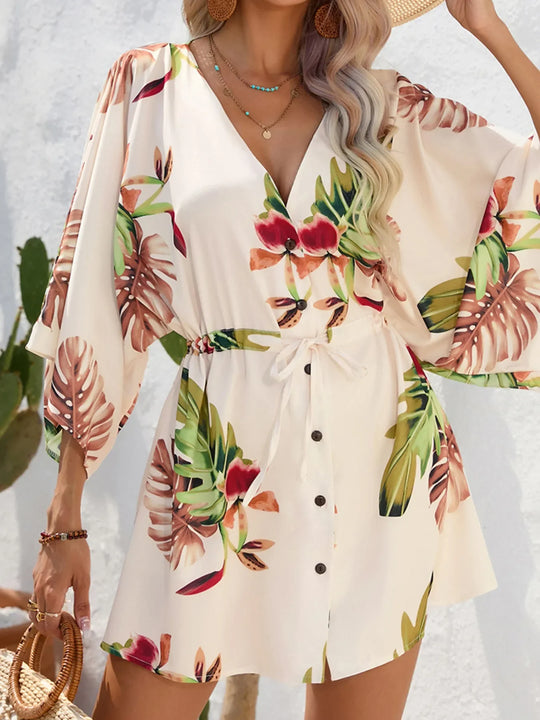 Cream floral button-up mini dress with V-neck and tie-waist front buttons