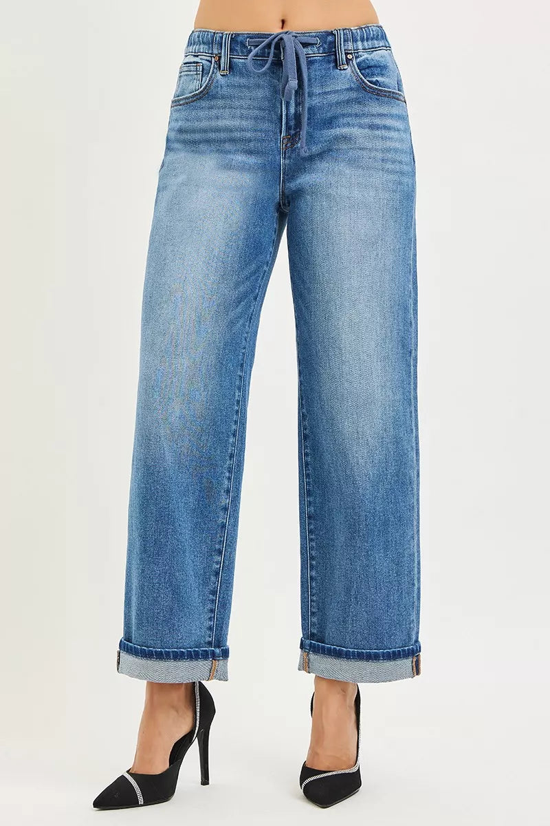 Medium wash jeans with elastic waist, slouchy boyfriend fit, cuffed ankle hem