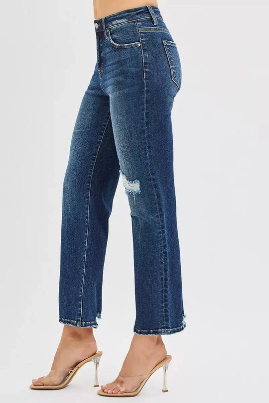 High-rise crop slim straight jeans, dark blue with side knee rip and frayed edges