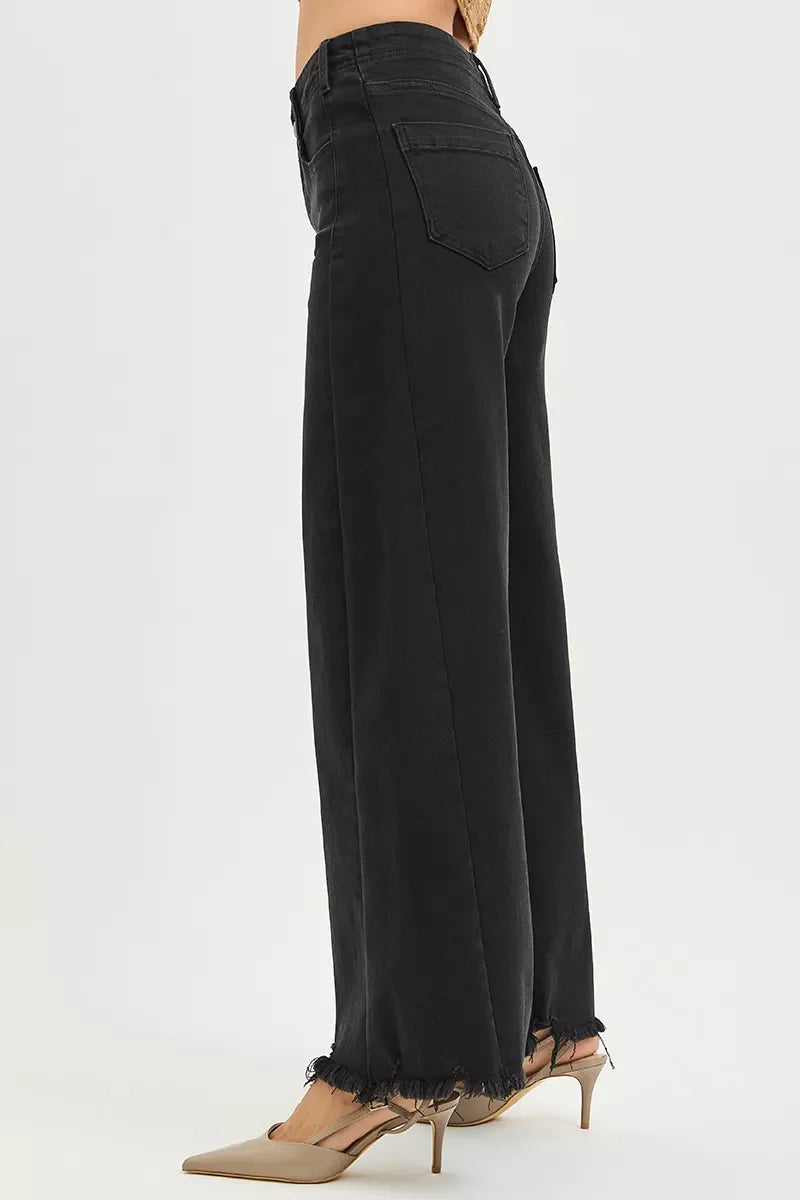 Black high-rise palazzo jeans back view with patch pockets and frayed hem