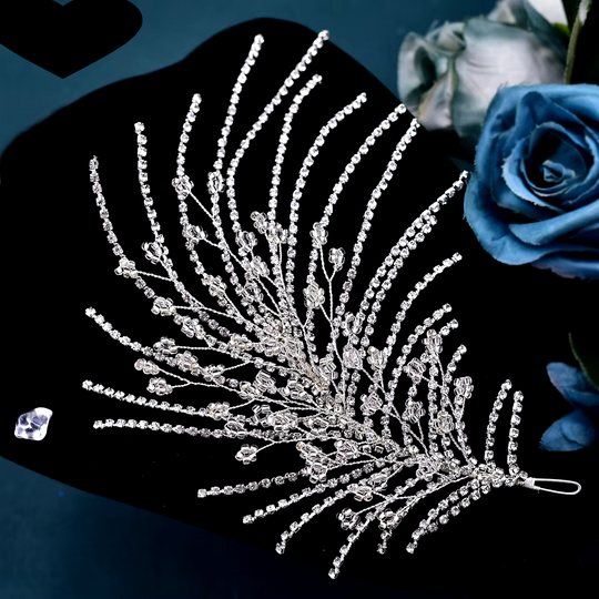 Silver rhinestone crystal tiara headband laid flat with long fan-shaped strands