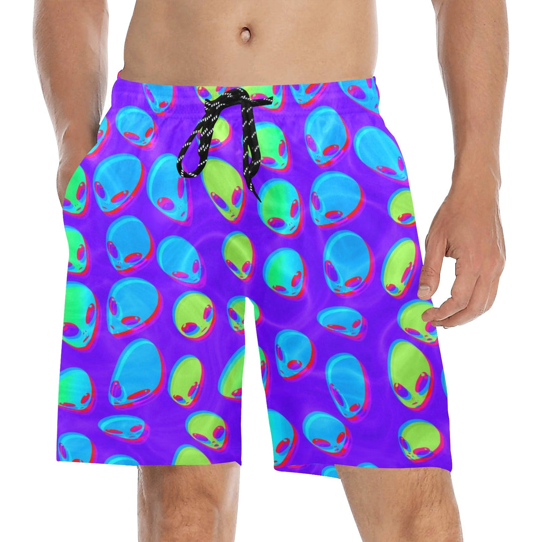 Purple alien glitch swim shorts with blue/green alien faces and black drawstring