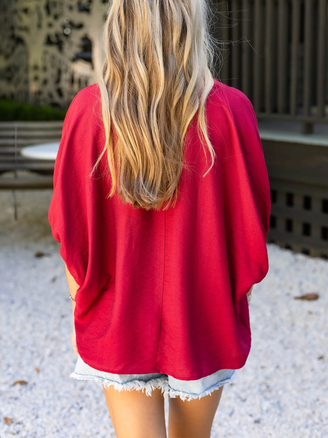 Deep Red half-sleeve blouse, relaxed fit with draped shoulders and curved hem