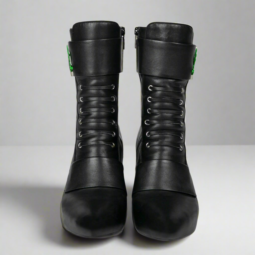 Black lace-up ankle boots back view with zipper and green side accents
