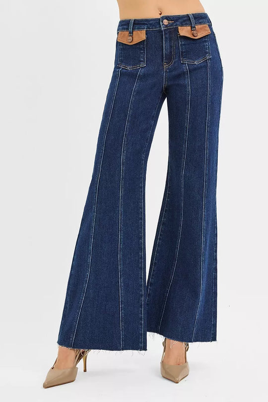 Dark high-rise wide-flare jeans, back view with two patch pockets and belt loops