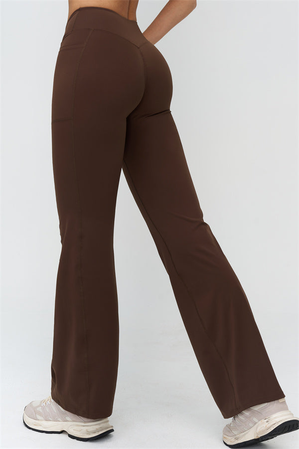 Leggings acampanados marrón con costuras laterales y dobladillo ancho