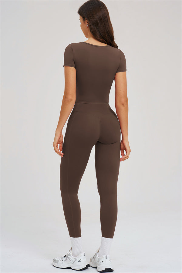 Taupe back view of fitted t-shirt top and high-rise leggings set
