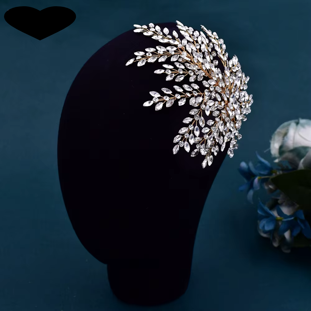 Silver rhinestone tiara headband, side view with leaf accents and clustered crystals