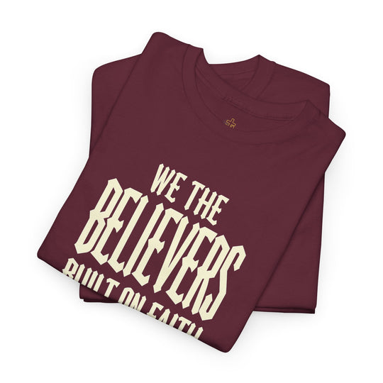 We The Believers maroon crew-neck T-shirt with white “We the believers” graphic text