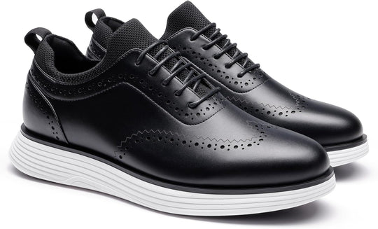 Black wingtip sneakers angled view with lace-up front and perforated panels