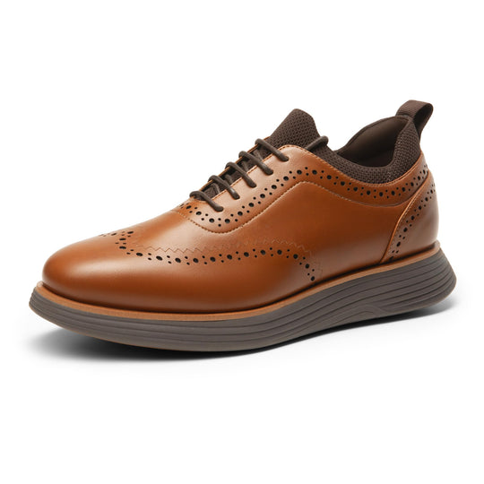 Light brown wingtip sneakers with lace-up, perforations, and dark heel collar