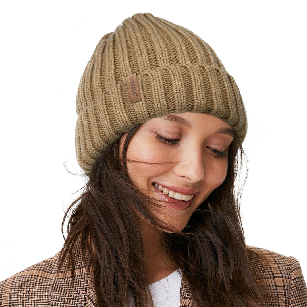 Fleece-lined chunky knit beanie in khaki beige, leather patch on the front