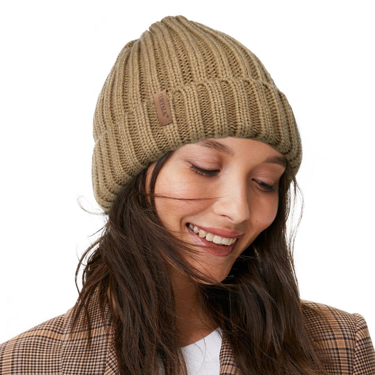 Fleece-lined chunky knit beanie in khaki beige, leather patch on the front