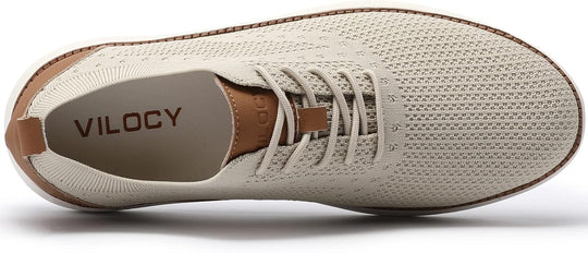Beige low-top mesh sneaker side view with brown-trim insole and white sole