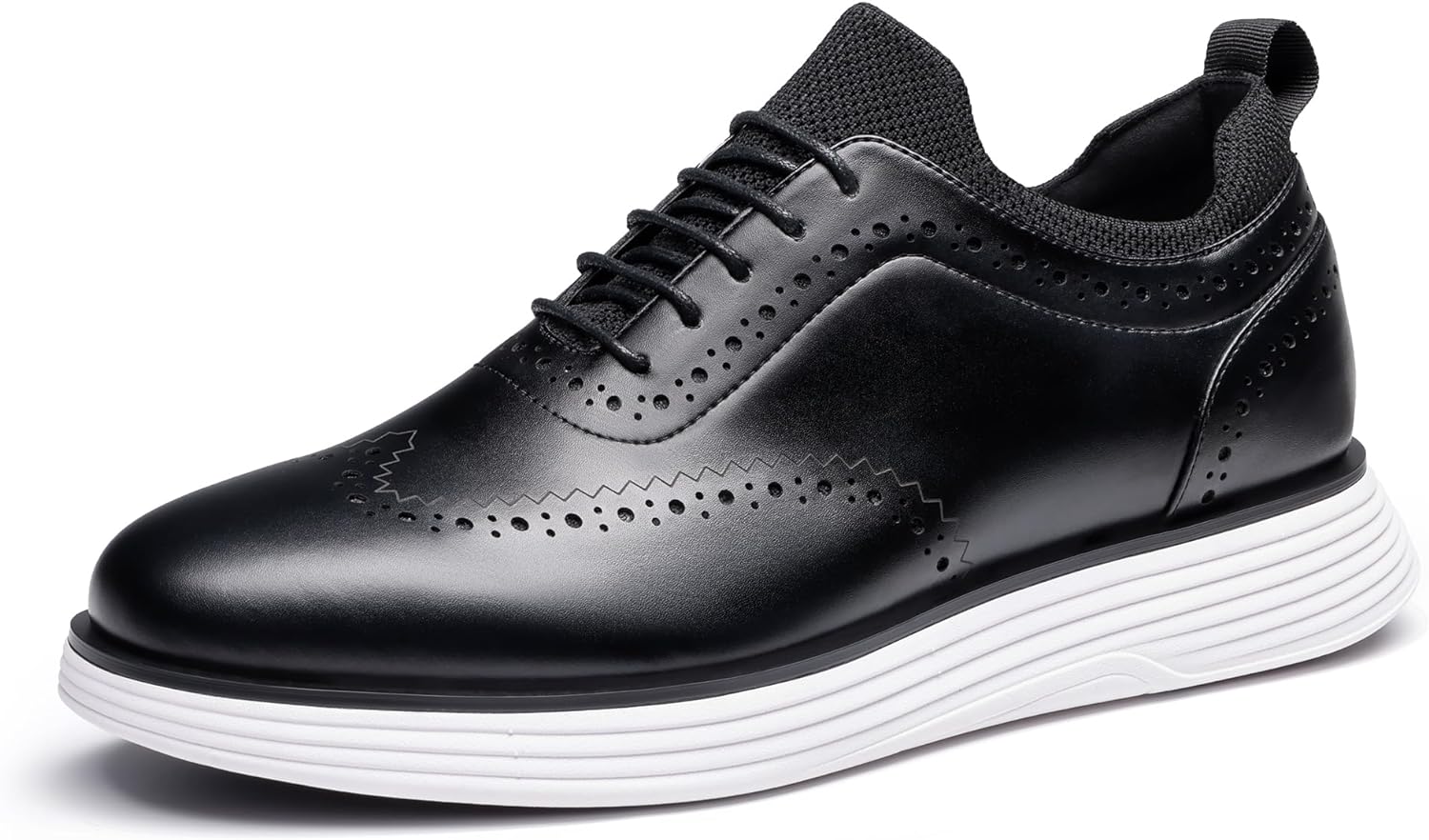 Black MaxFlex wingtip sneakers with lace-up front and perforated brogue detailing
